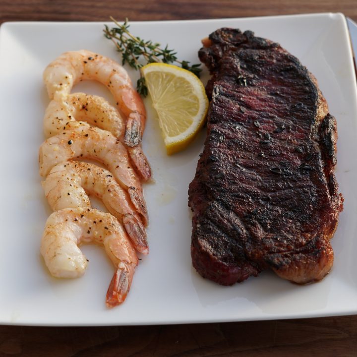 Reverse Seared New York Strip Steak and Smoked Buttery Shrimp